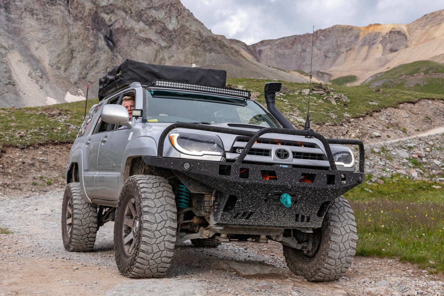 Toyota 4th gen 4runner front bumper with roof rack a lift kit and mods done to the interior and exterior.