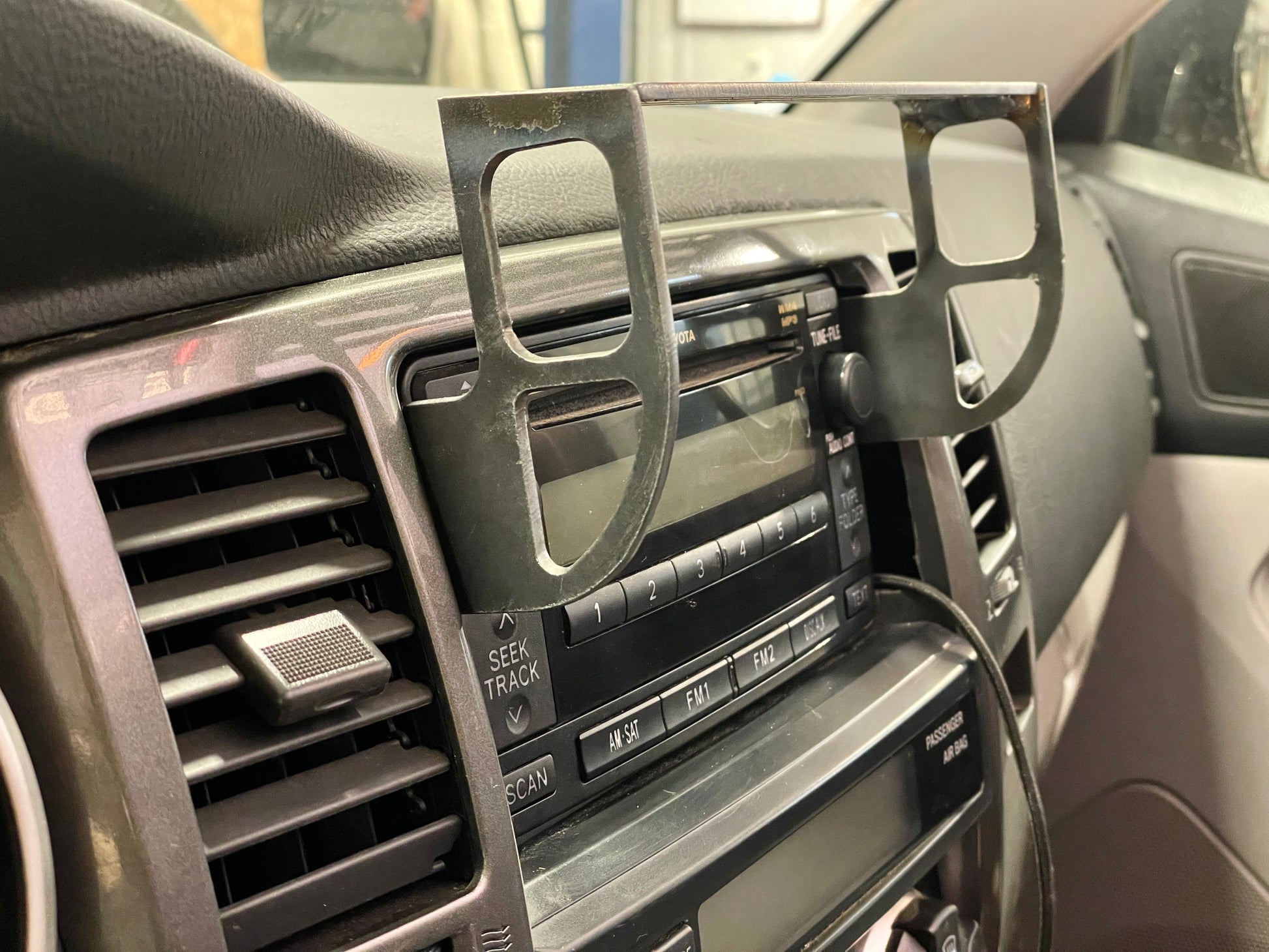 4th gen 4runner interior dash mount mod bracket for mounting phones and tablet holders radios and more.